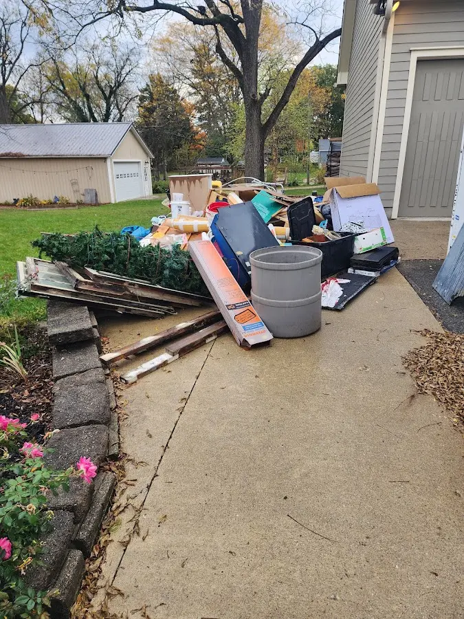 Dumpster being loaded with debris for 30 Yard Dumpster Rental in Costa Mesa